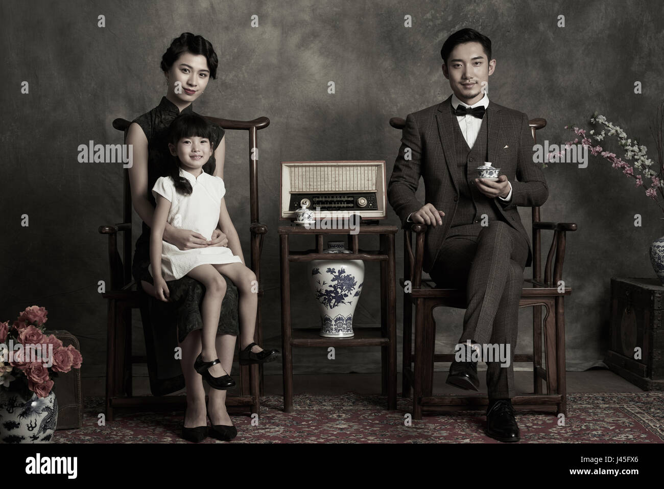 Klassischen Stil einer Familie von drei Foto Stockfoto