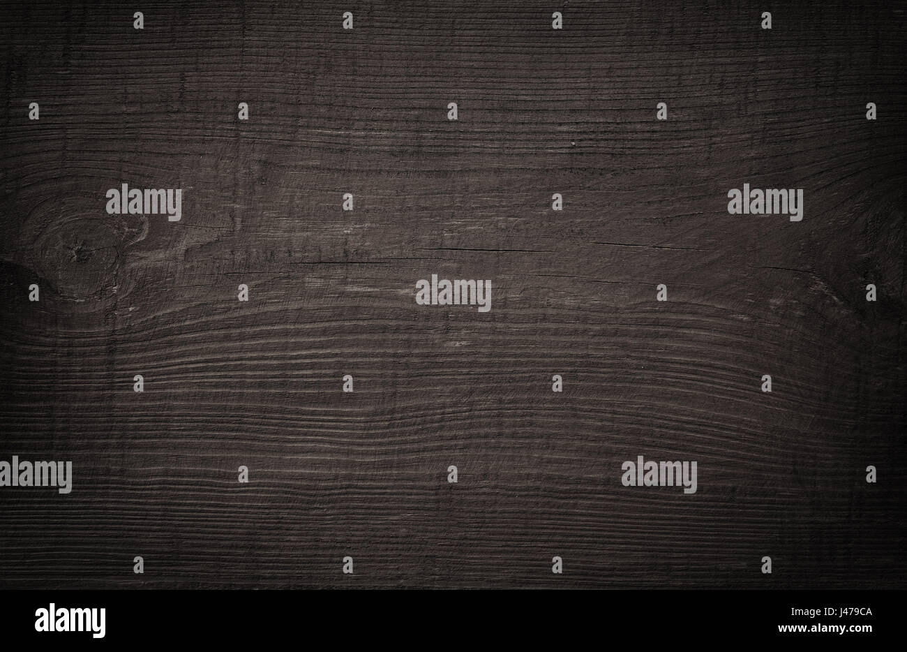Schwarz Holz Schneidebrett verkratzt. Stockfoto