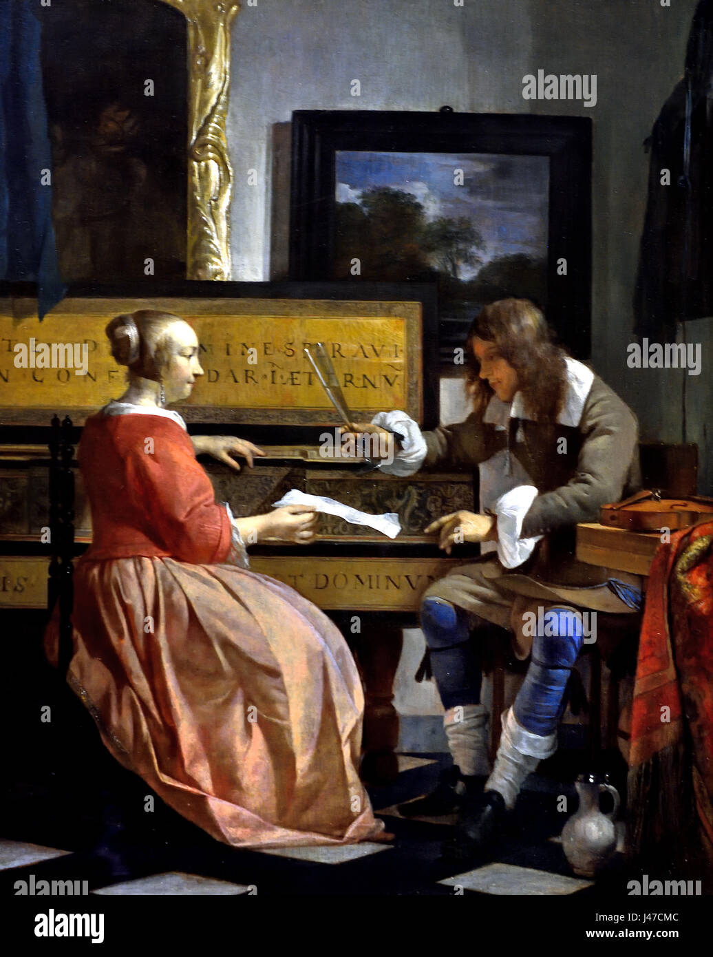 Ein Mann und eine Frau sitzen von einer jungfräulichen 1665 Gabriel METSU 1629-1667 Niederlande Niederlande Stockfoto