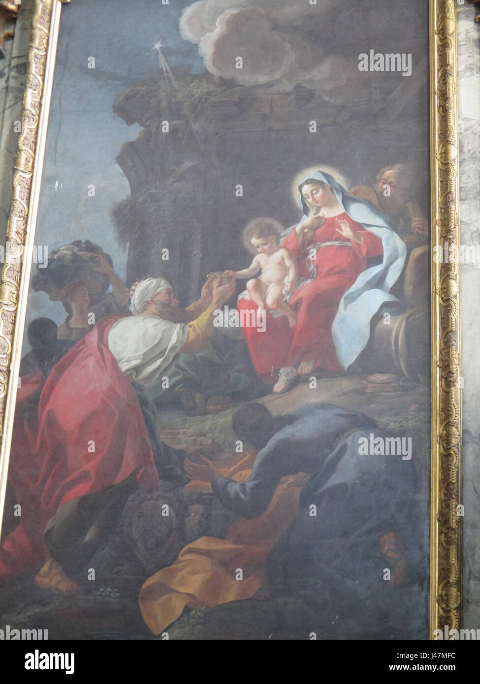 Parrocelâ Anbetung des Mages ist ein religiöses Gemälde, das die biblische Szene der drei Weisen darstellt, die dem Jesuskind Geschenke überreichen. Sie befindet sich in Amiens. Stockfoto