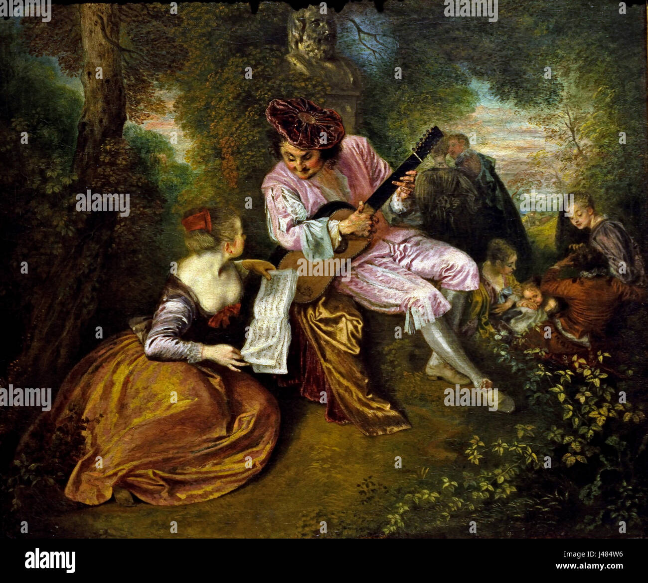 La Gamme d ' Amour (das Ausmaß der Liebe 1715-1718 Jean-Antoine Watteau (1784-1721) Frankreich französischer Maler und Grafiker. (Ein Mann mit Hut samt Ständchen in einer Waldlandschaft eine Mädchen mit seiner Gitarre. Im Hintergrund gehen die beiden Liebenden in den Wald. ) Stockfoto