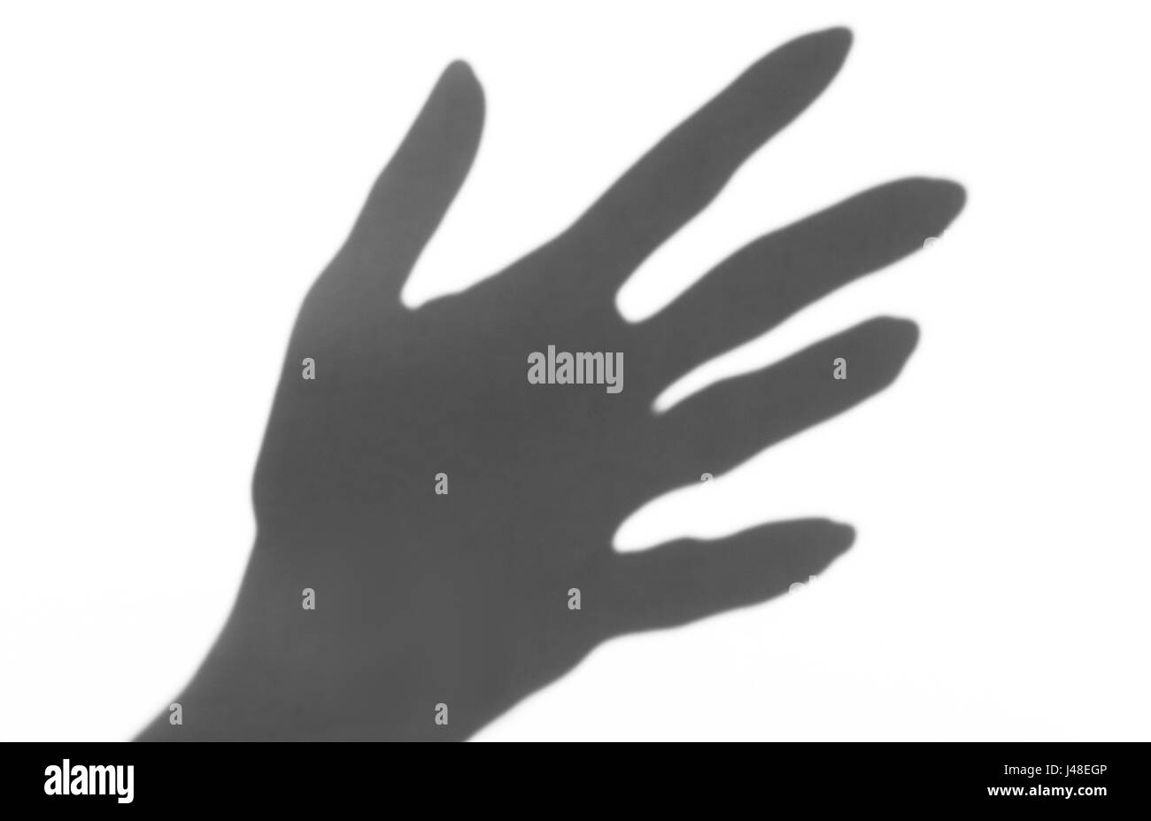 der Schatten von der Hand weißen Hintergrund Nahaufnahme Stockfoto