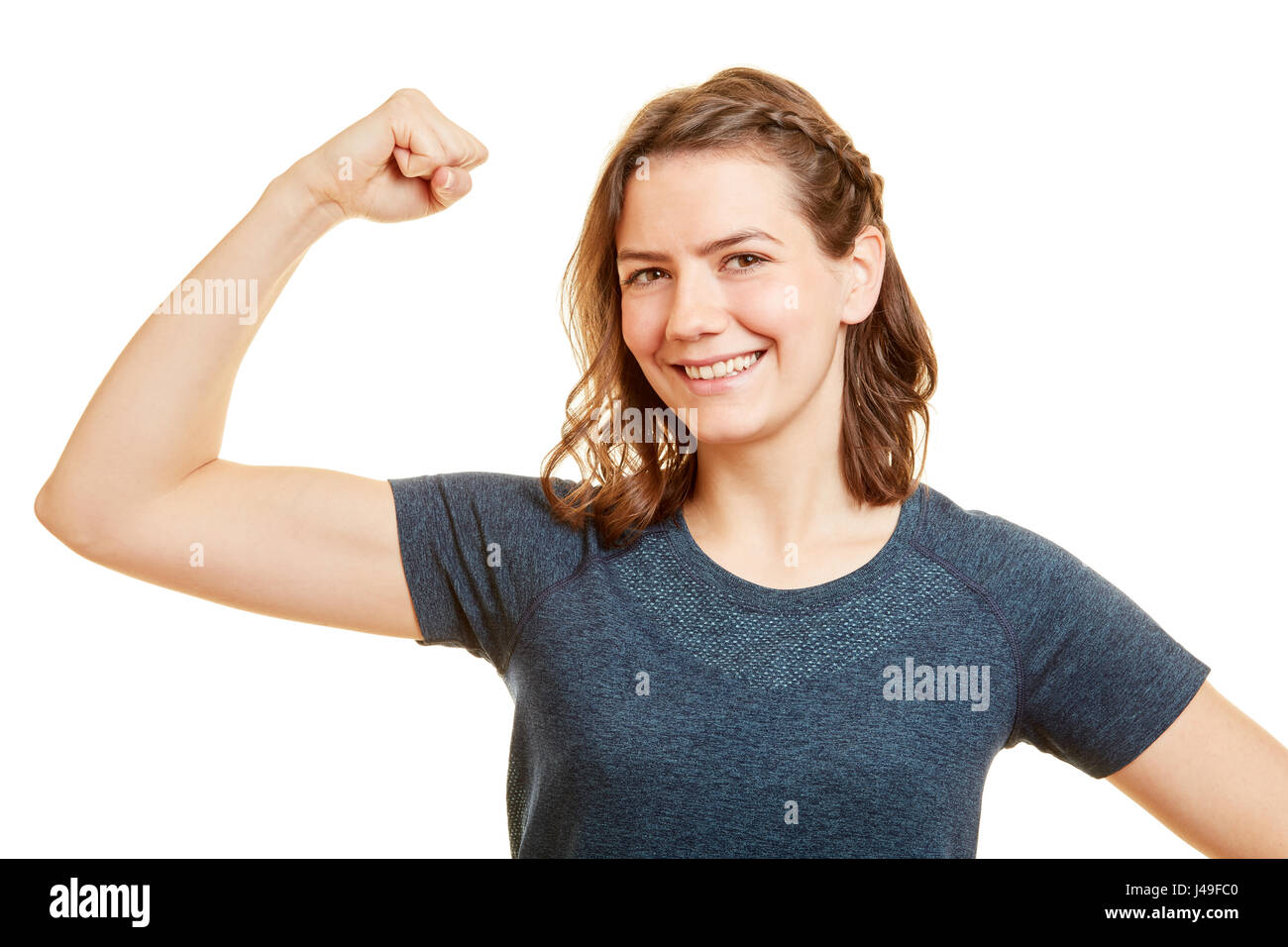 Starke Frau zeigt ihre Armmuskeln mit power Stockfoto