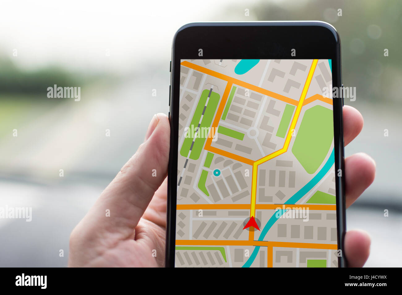 GPS-Navigation auf Handy-Gerät und Transportkonzept. Männliche Hand  Navigation System Parkplan Tracking auf Smartphone mit Textfreiraum  Stockfotografie - Alamy