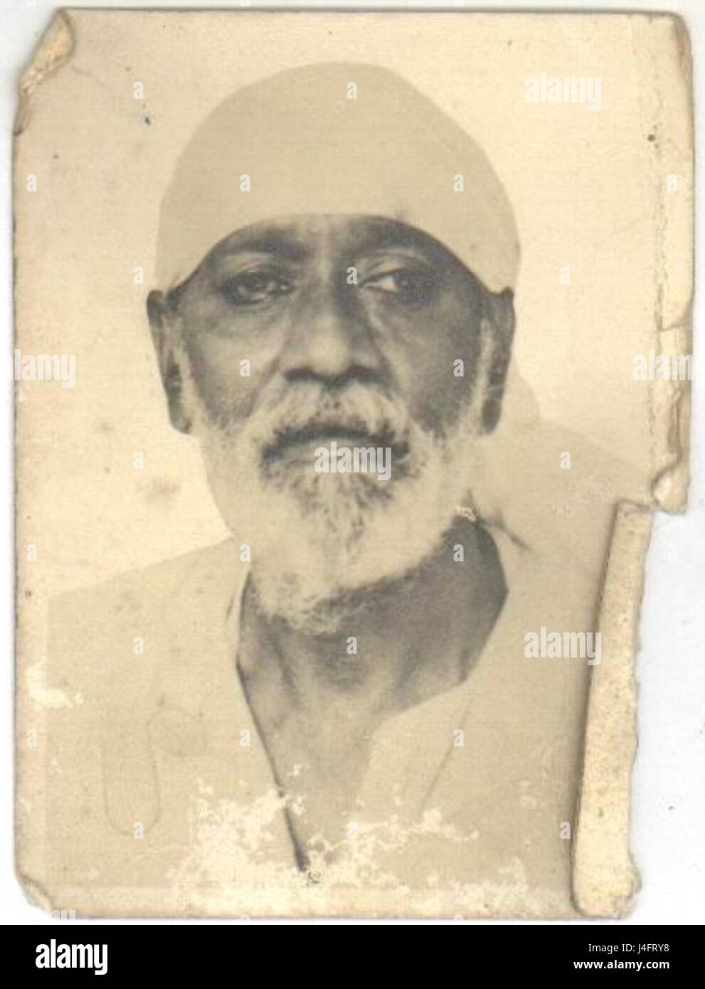 Shirdi Sai Baba, eine verehrte spirituelle Figur in Indien, ist bekannt für seine Lehren von Liebe, Mitgefühl und Hingabe. Das Originalbild fängt sein Gleichnis ein und symbolisiert seinen Einfluss auf religiöse und spirituelle Praktiken. Stockfoto