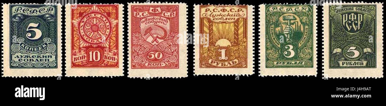 Die Briefmarken von Luga Sovdep 1918 spiegeln die sowjetische Geschichte wider und zeigen Bilder und Propaganda aus der frühen sowjetischen Ära aus dem Jahr 1918, einer Zeit bedeutender politischer Veränderungen in Russland. Stockfoto