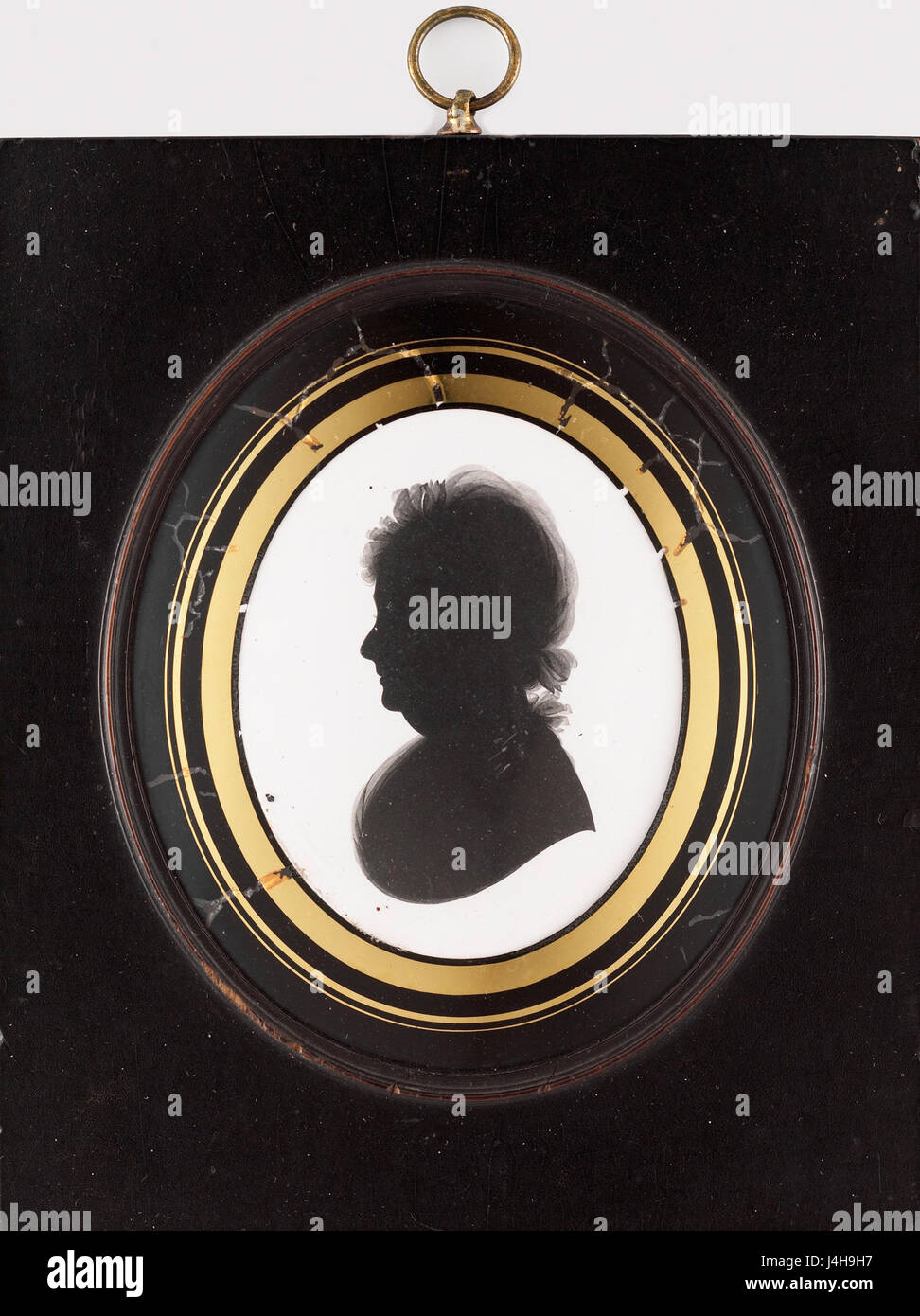 Diese Silhouette einer Frau, die im Rijksmuseum untergebracht ist, stellt eine historische Darstellung der Weiblichkeit dar und demonstriert die einfache und doch tiefgreifende Natur der frühen Silhouettenkunst in der europäischen Kultur. Stockfoto