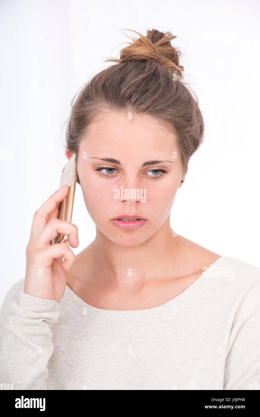 Frau am Handy, Studio gedreht. Stockfoto