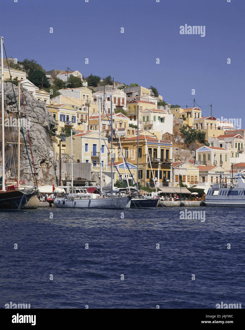 Griechenland, Insel Simi, Simi Stadt, Stadt anzeigen, Fischerei Hafen des Dodekanes, Insel, Syme, dem Ägäischen Meer, Ägäis, Stadt, südliche Sporaden, Inselgruppe, Ansicht, Häuser, Wohnhäuser, Hafen, Fischerboote, draußen Stockfoto