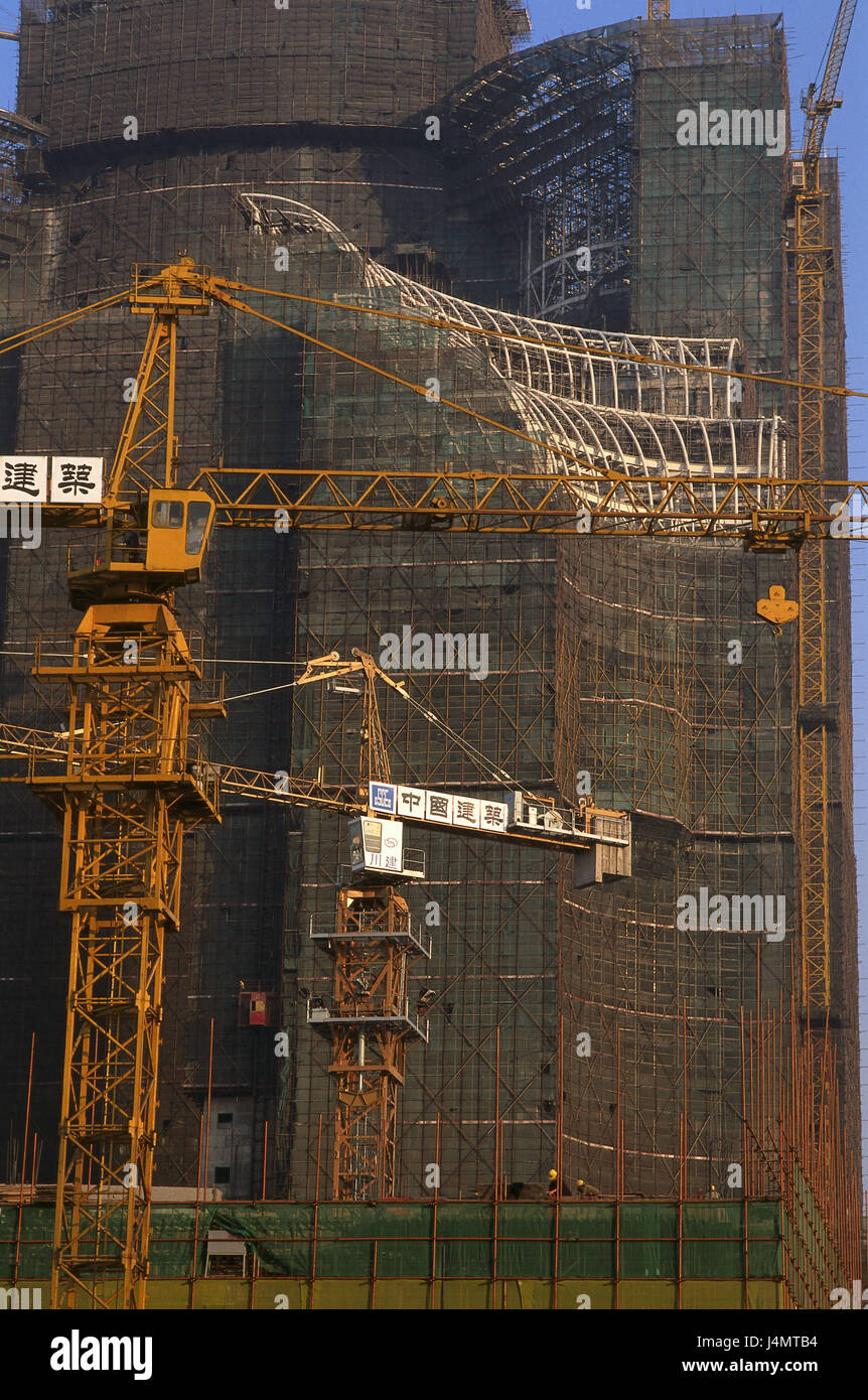 China, Provinz Guangdong, Shenzhen, Hochhaus, Männer bei der Arbeit, zu Asien, Ost-Asien, Süd-China, Stadt, Wirtschaft, Bauwesen, Bauunternehmer, Bauphase, Architektur, Baumaschinen, Gerüst, Gerüste, Baukran Kran Stockfoto