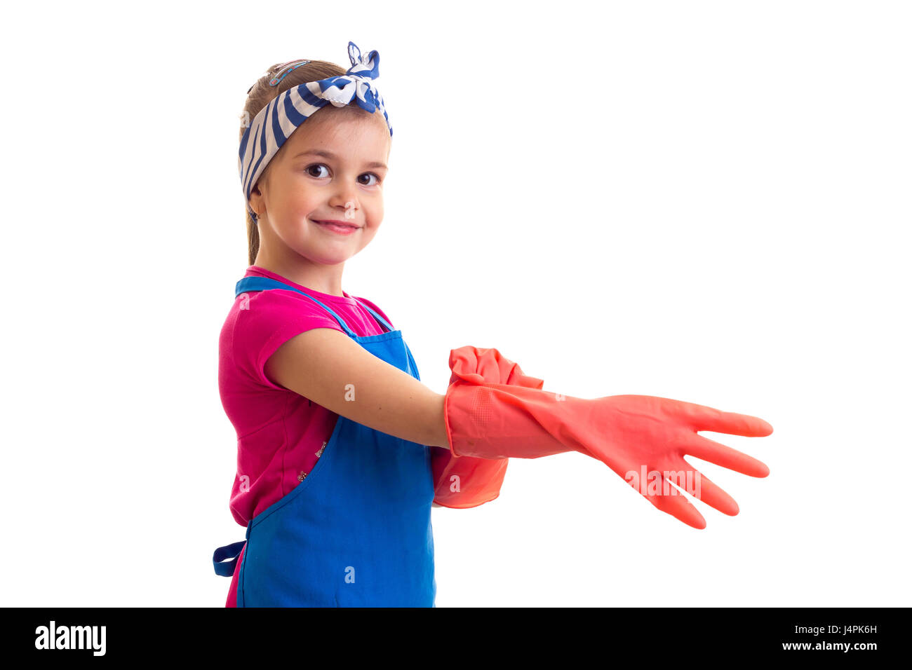 Mädchen mit Schürze und Handschuhe Stockfoto