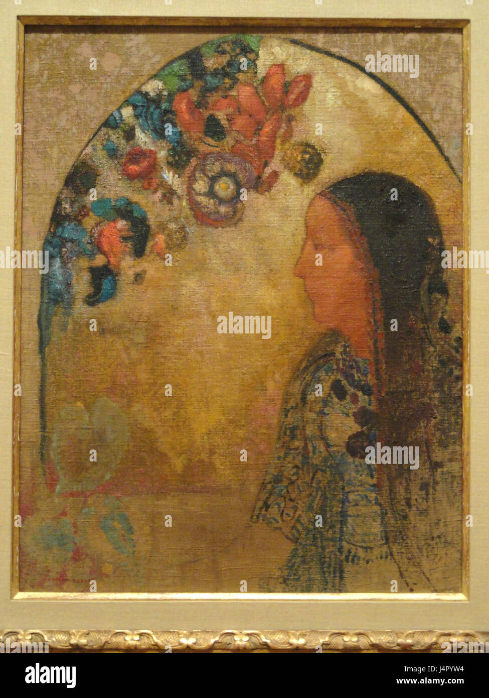 „The Gothic Window“ von Odilon Redon ist ein eindrucksvolles Stück im Indianapolis Museum of Art Das Werk zeichnet sich durch raffinierte, ätherische Details aus, die für Redonâ einzigartigen Stil charakteristisch sind und lebendige Farben mit dunklen Kontrasten verbindet. Stockfoto