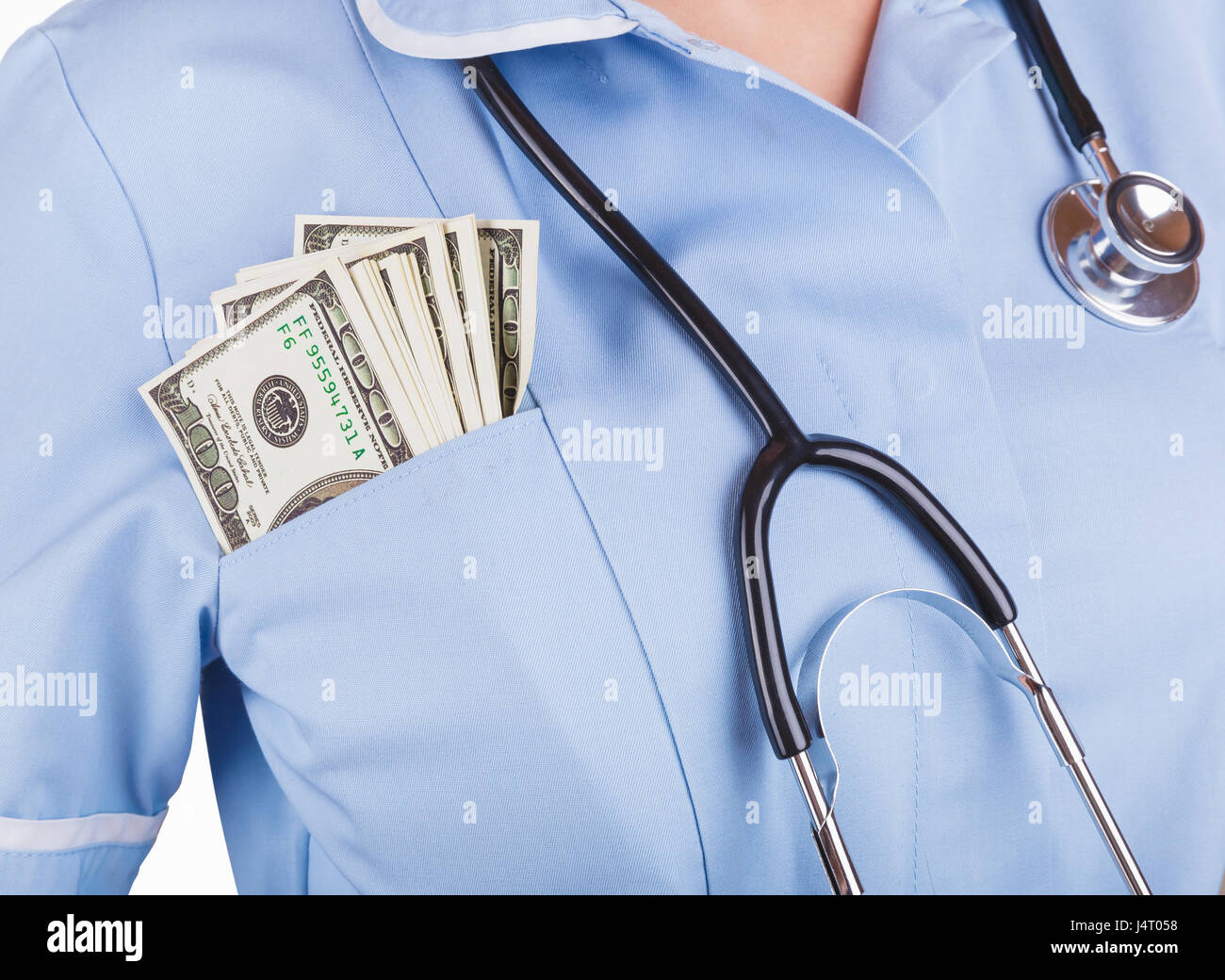 Ärztin mit Geld in der Tasche eine blaue robe Stockfoto