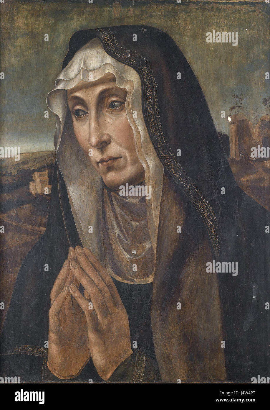 Die Trauernde Madonna, ein spanisches Kunstwerk aus dem 16. Jahrhundert, stellt die Jungfrau Maria in Trauer dar, ein gängiges Thema in der religiösen Kunst der Renaissance und des Barocks. Stockfoto