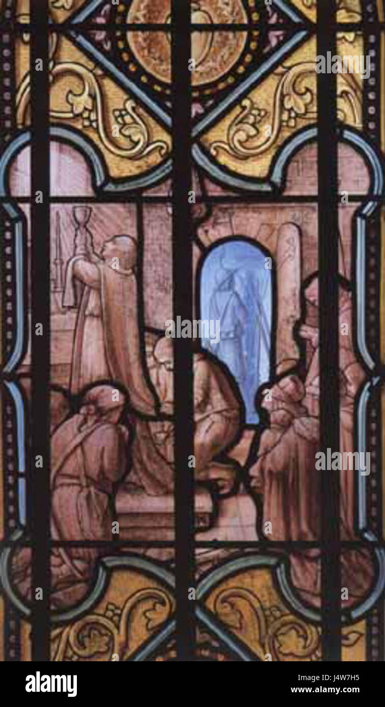 Dieses Buntglaskunstwerk zeigt einen Gottesdienst, der während der Zeit des Terrors der Französischen Revolution, insbesondere im Haus von Joseph Brault, abgehalten wurde und die Spannungen der Epoche erfasst. Stockfoto