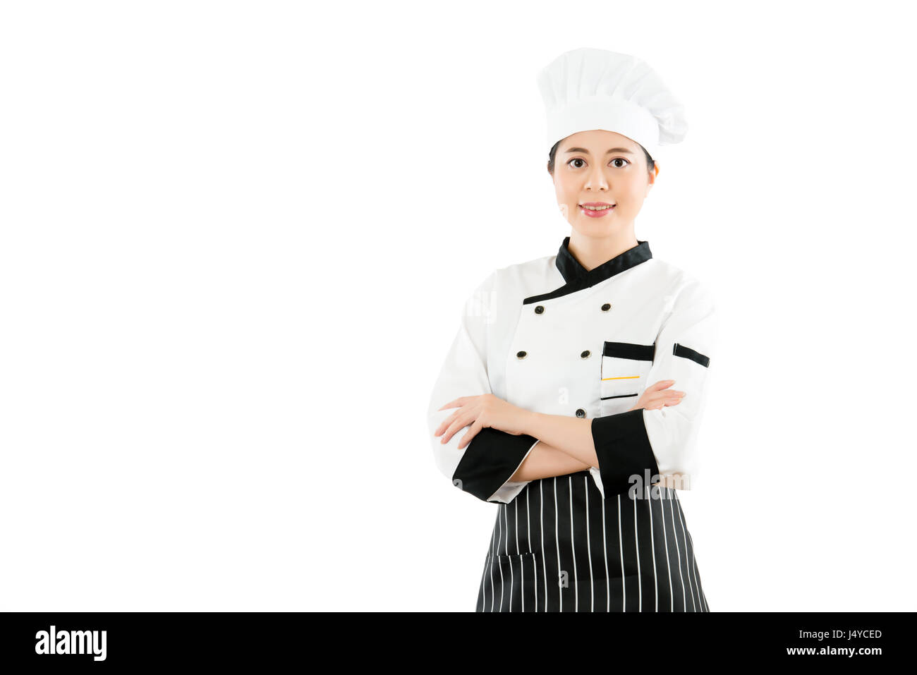 erfolgreiche zuversichtlich Mischlinge asiatische chinesische Frau Koch Kreuz Hand-Arm-Gesicht zur Kamera isoliert auf weißem Hintergrund. Beruf und Branche Job conce Stockfoto