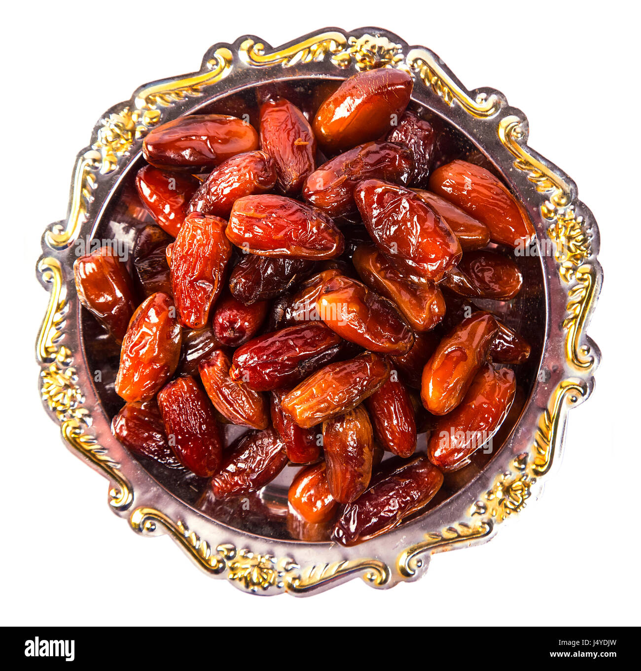 Schöne Termine Obst auf einem silbernen Tablett isoliert auf weißem Hintergrund. Das muslimische Opferfest des Heiligen Monats Ramadan Kareem. Stockfoto