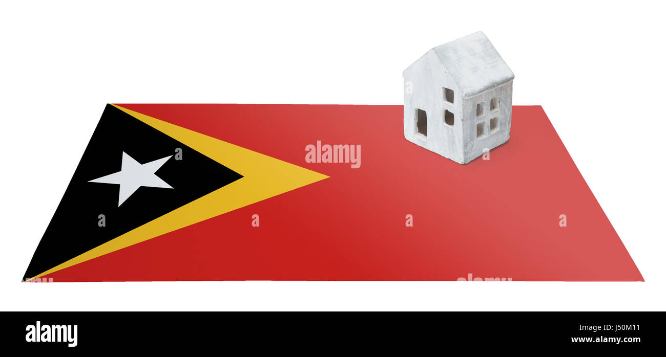 Kleines Haus auf eine Flagge - lebende oder migrieren nach Ost-Timor Stockfoto