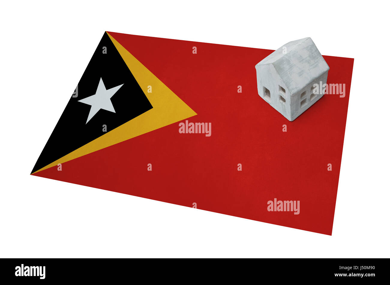 Kleines Haus auf eine Flagge - lebende oder migrieren nach Ost-Timor Stockfoto