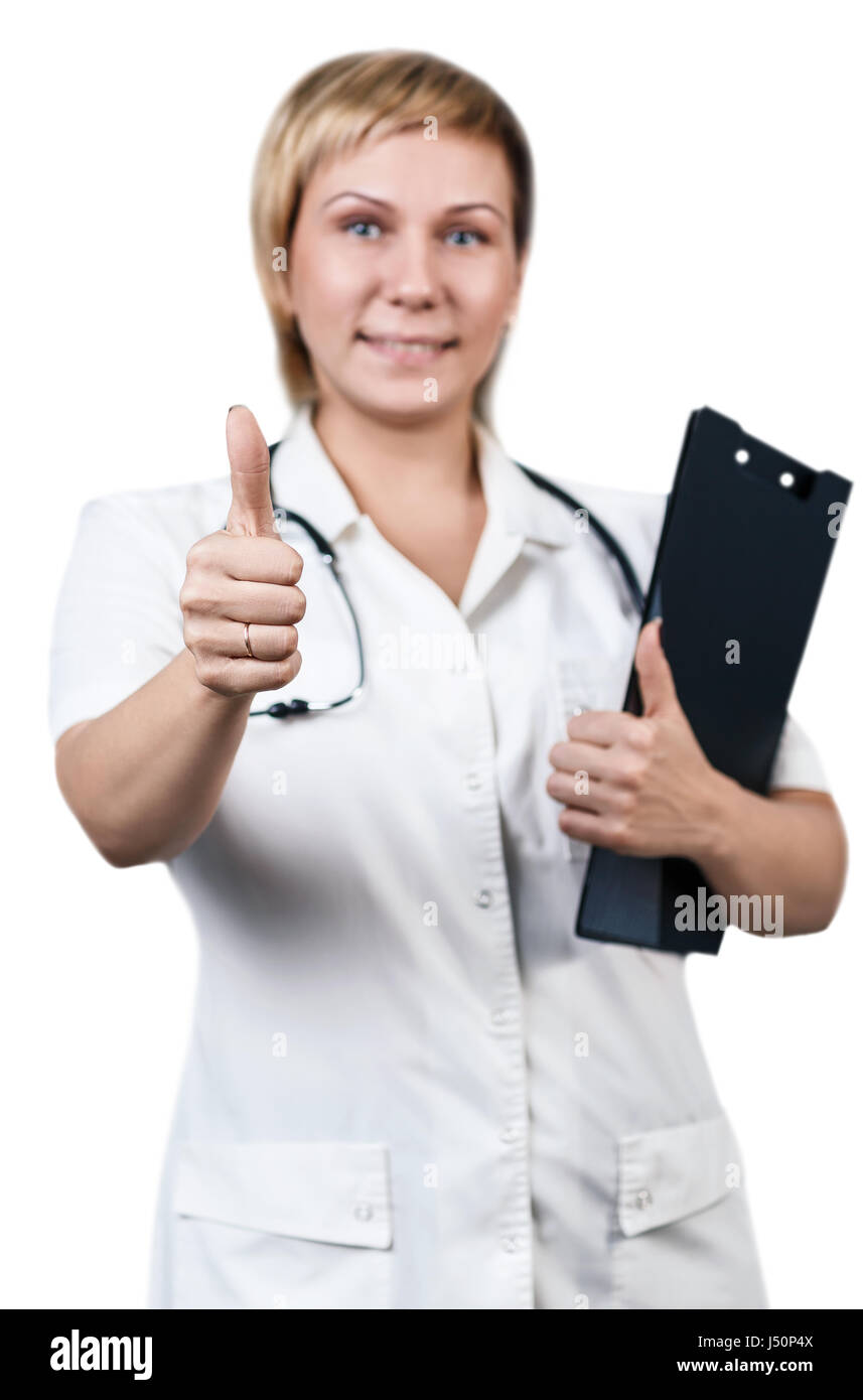 Doktor der Medizin mit Daumen hoch Geste isoliert auf weiss lächelnd. Stockfoto