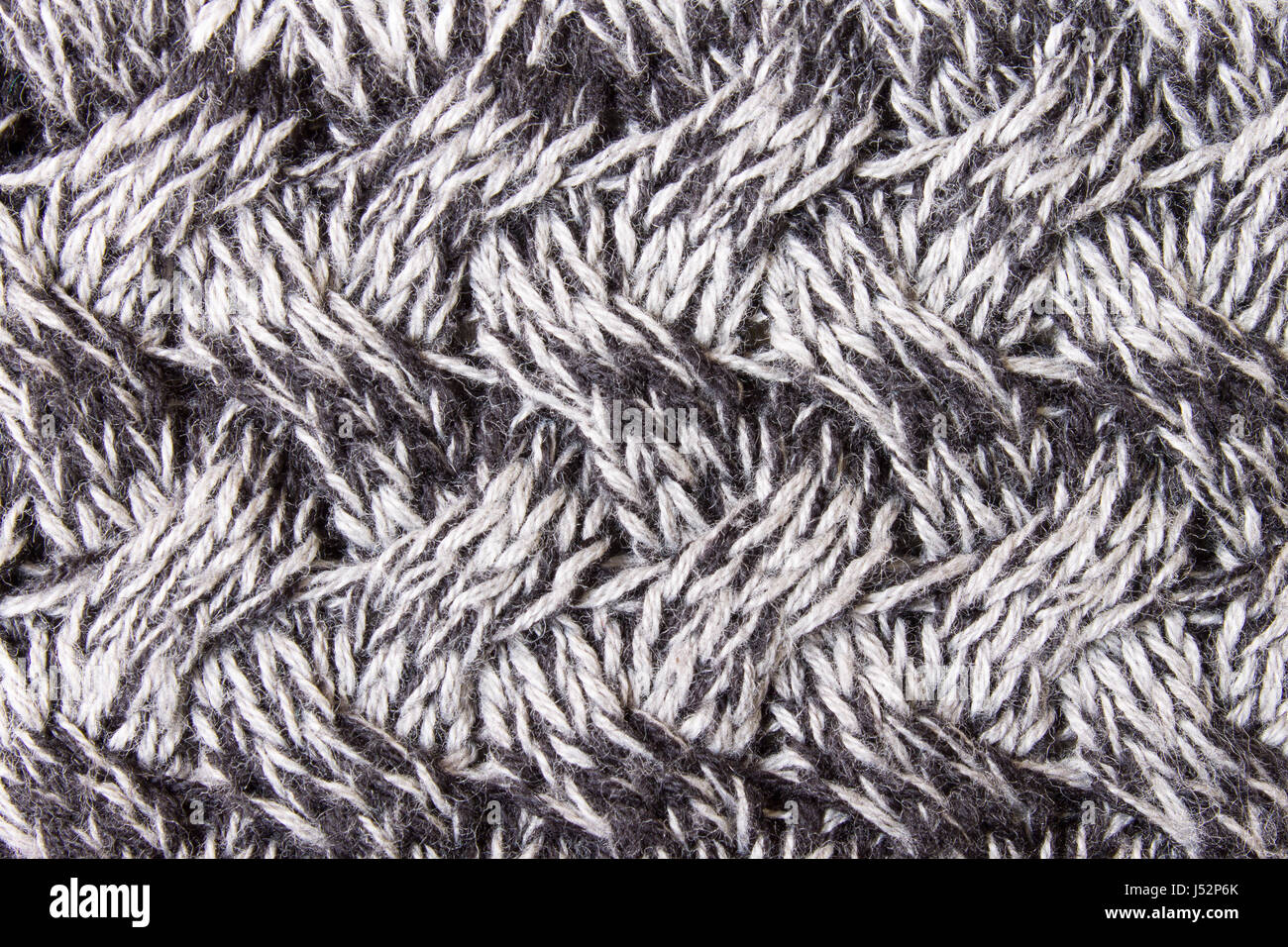 Schwarz und weiß Stoff Textilhintergrund oder Hintergrund, Strickmuster stricken. Stricken oder