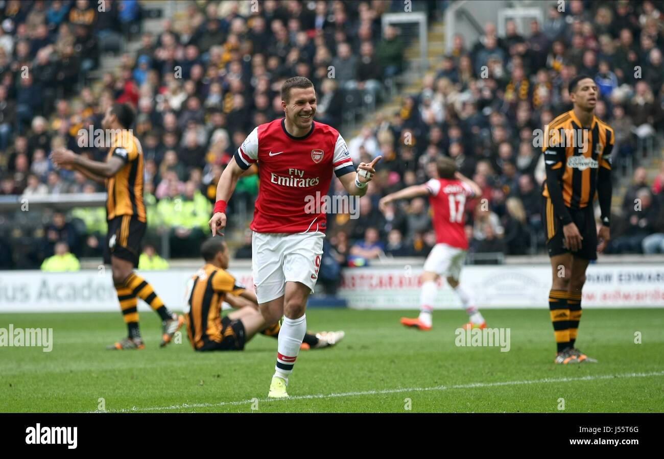 LUKAS PODOLSKI feiert MAKI HULL CITY V ARSENAL KC STADIUM HULL ENGLAND 20. April 2014 Stockfoto