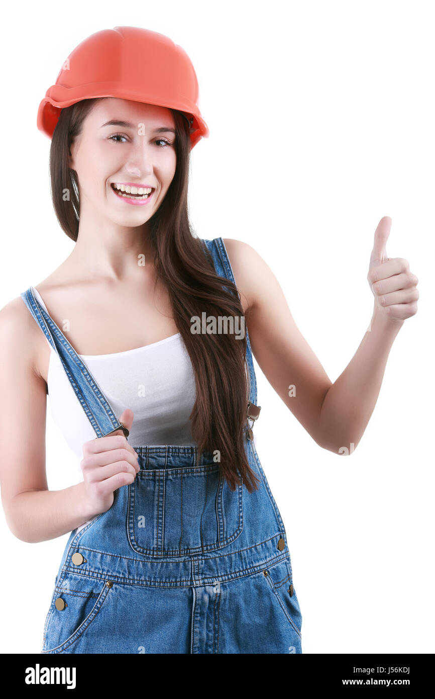 Porträt der jungen weiblichen Baumeister in Helm Malerei auf weiß Stockfoto