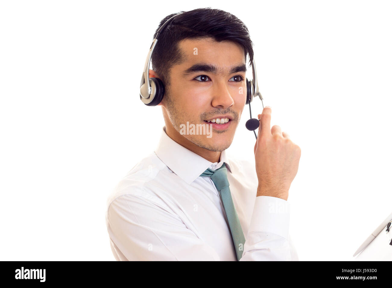 Junger Mann im Kopfhörer halten einen Ordner Stockfoto