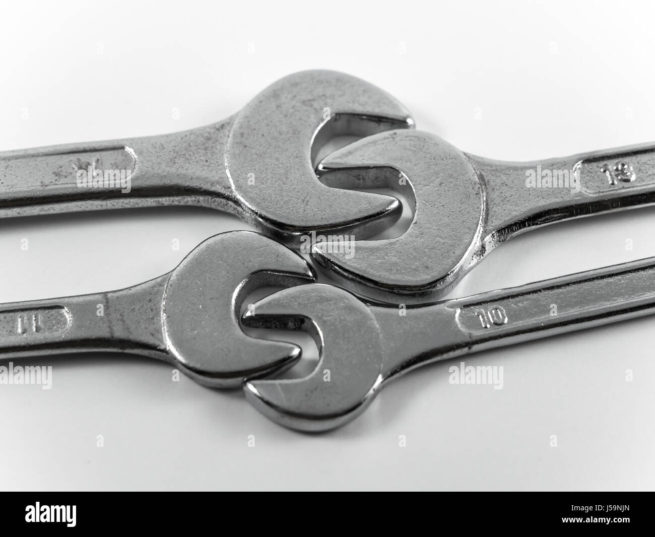 Vier Schraubenschlüssel passend zueinander paarweise Stockfoto