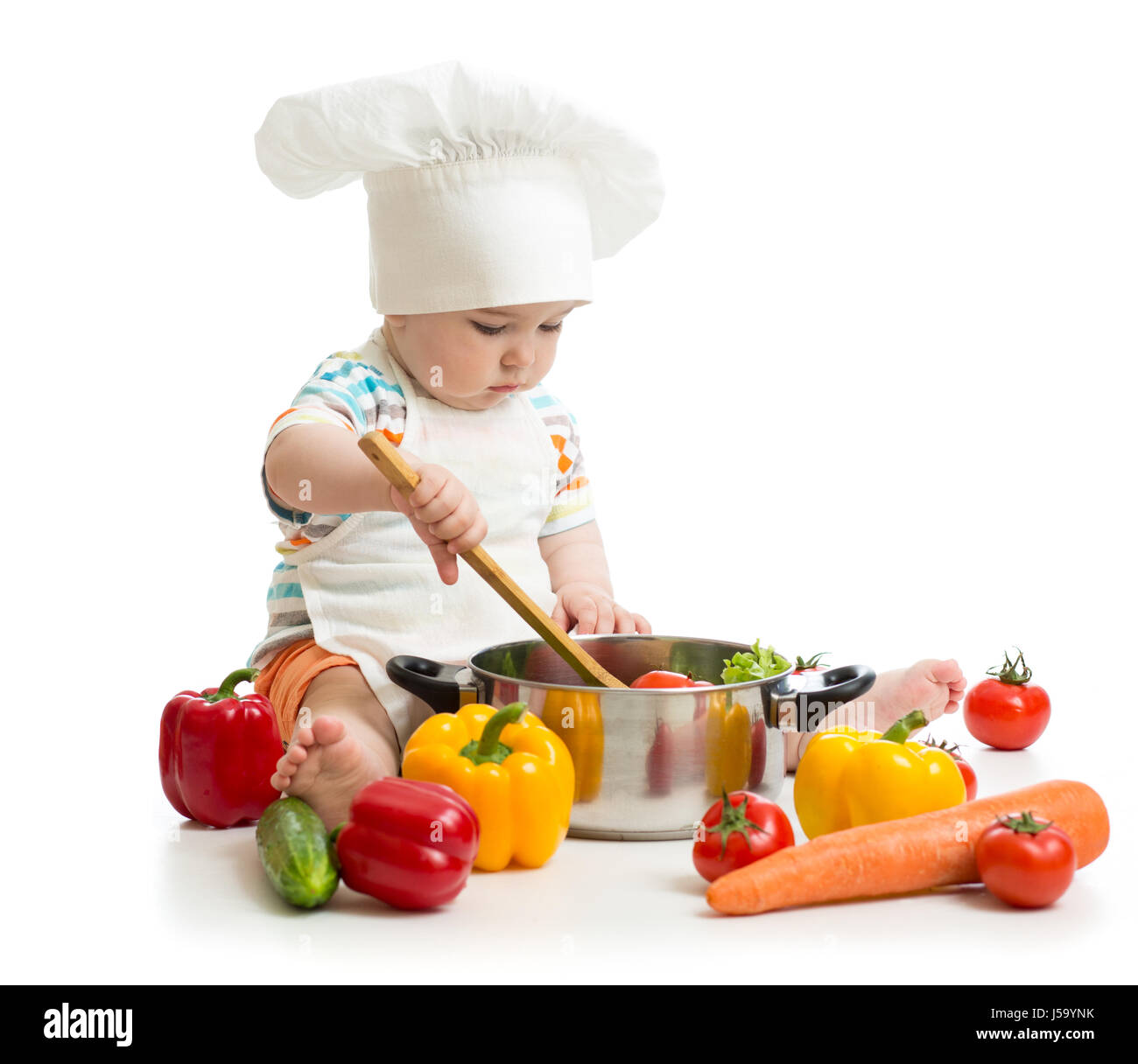 Baby-Koch mit gesunden Essen Gemüse und pan Stockfoto