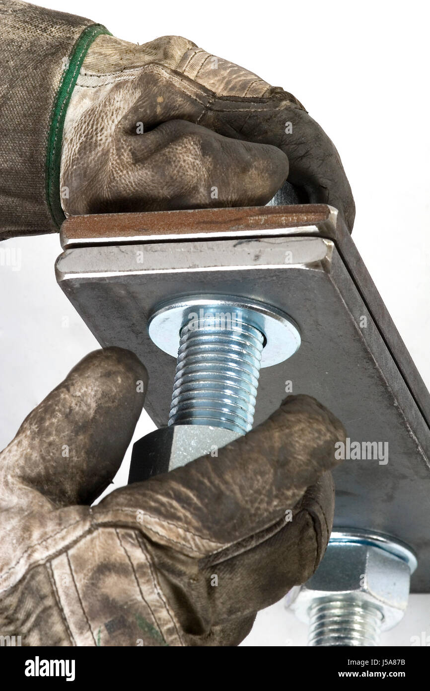 eisernen Schrauben Stahl Metall Böden Rost hell glänzenden Mütter schmutzig Thread Schlosser Stockfoto