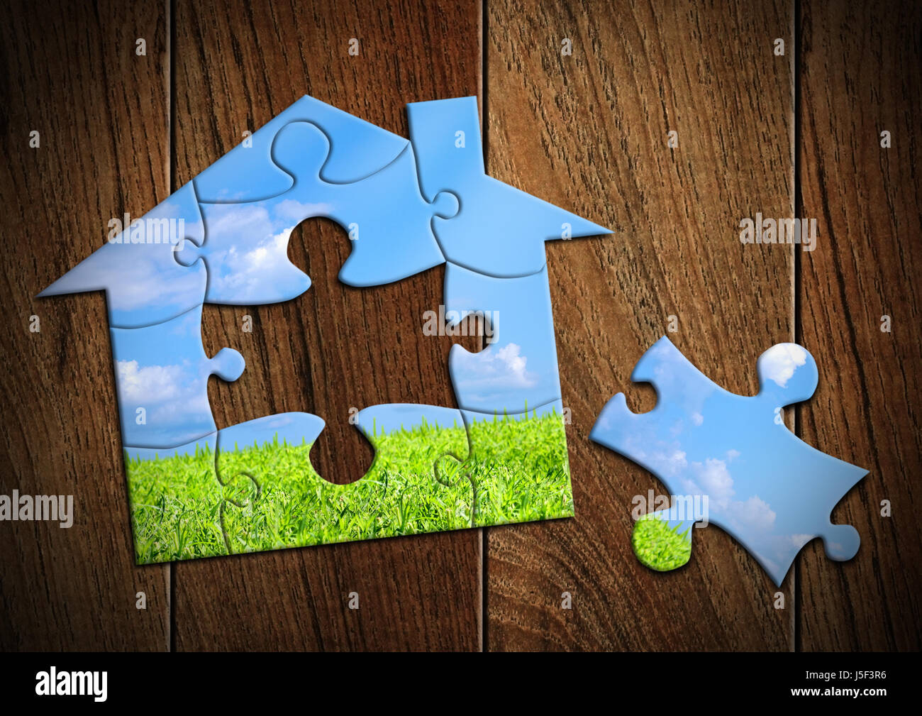 Öko-Haus-Konzept, Heimat von puzzle Stockfoto
