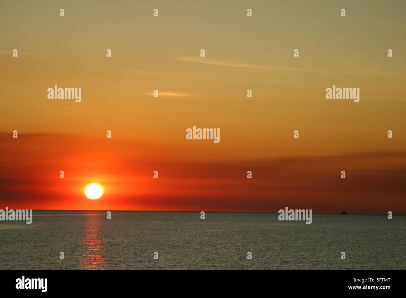 Sonnenuntergang am Abend Australien Glanz Firmament Himmel Salzwasser Meerwasser Ozean Stimmung Stockfoto