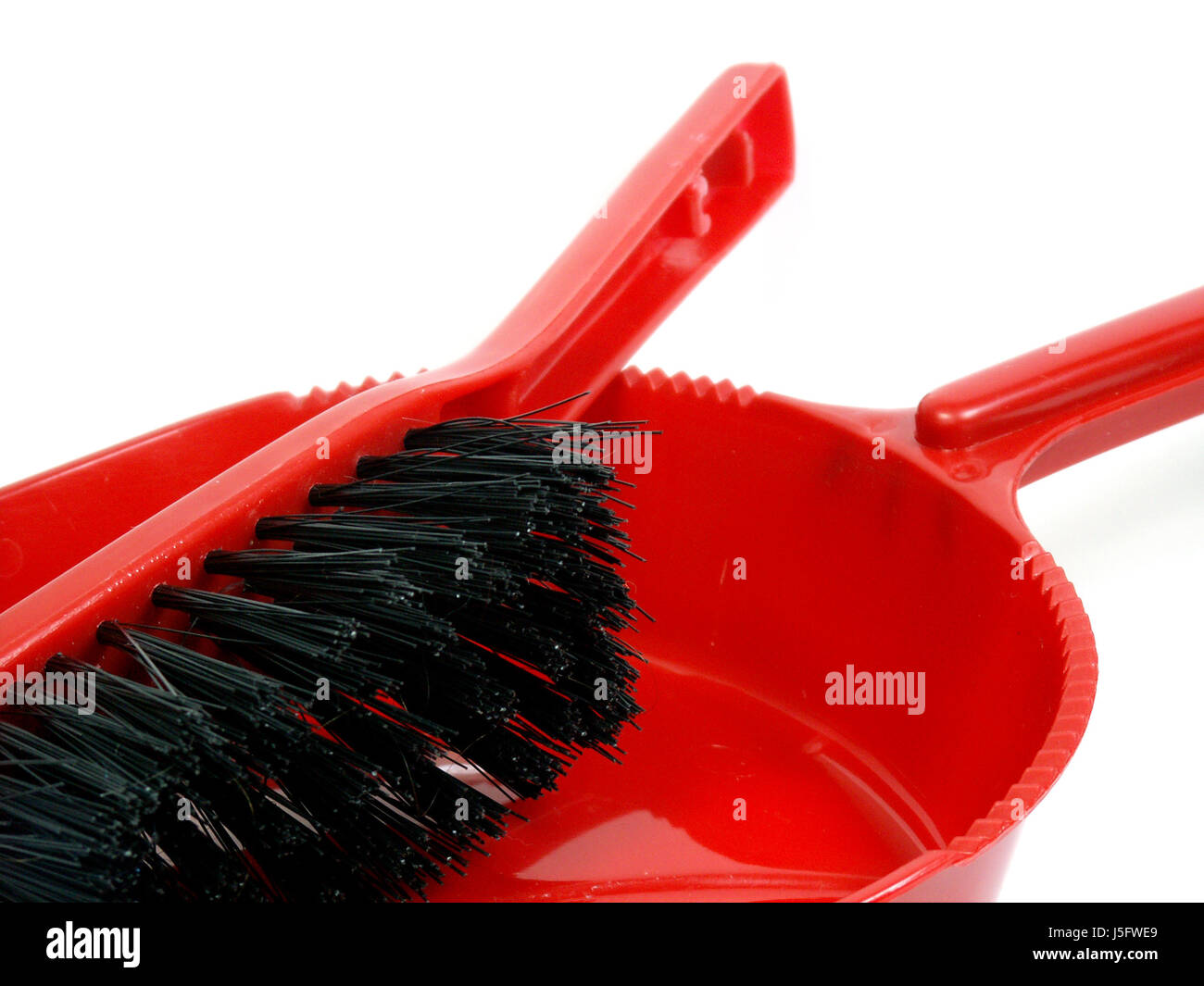 Einlieferung Hausfrau Haushalt reinigen nachpolieren Schaufel Besen Handfeger sauber Stockfoto