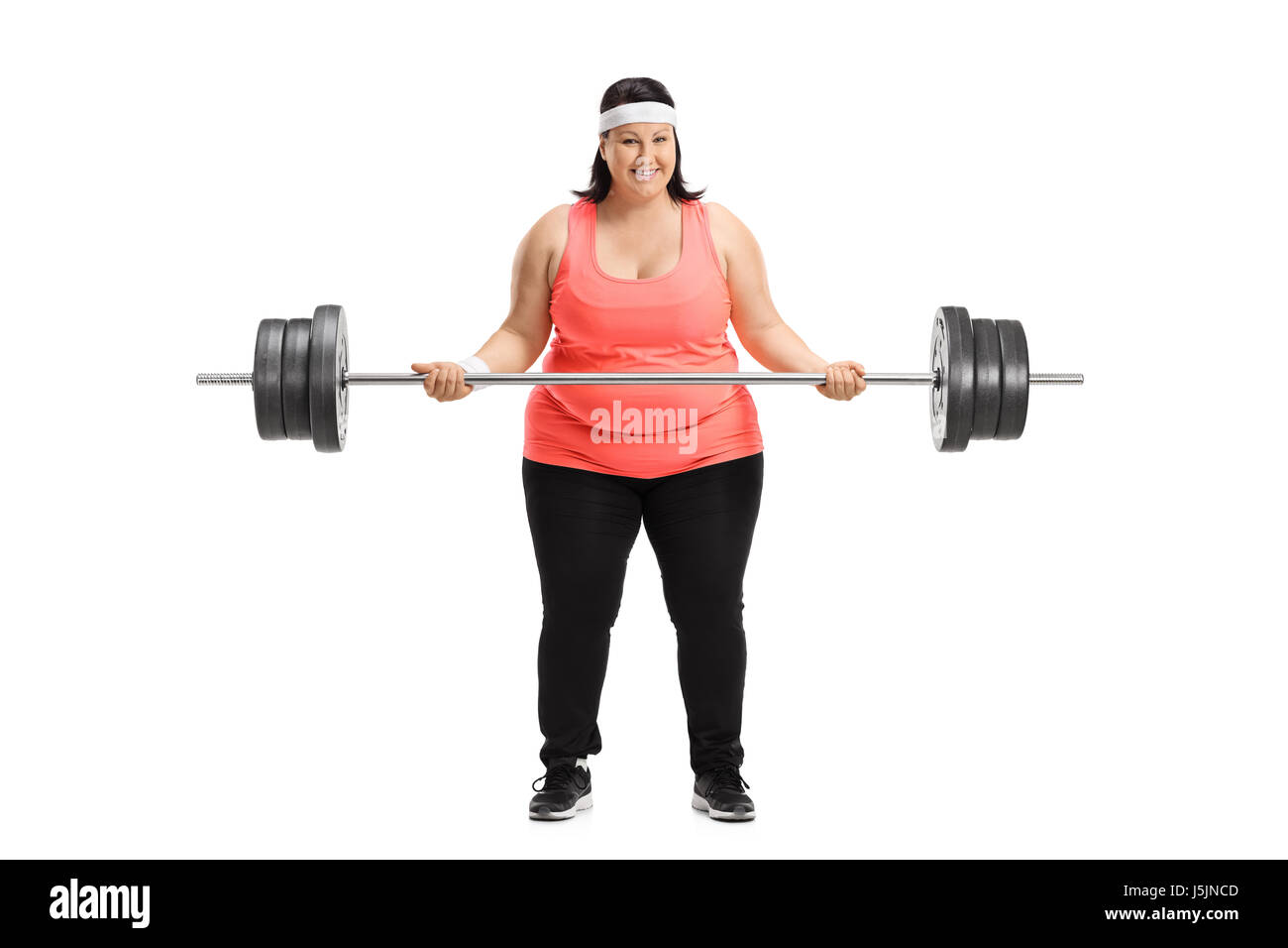 Voller Länge Porträt einer übergewichtigen Frau heben eine große Kurzhantel isoliert auf weißem Hintergrund Stockfoto