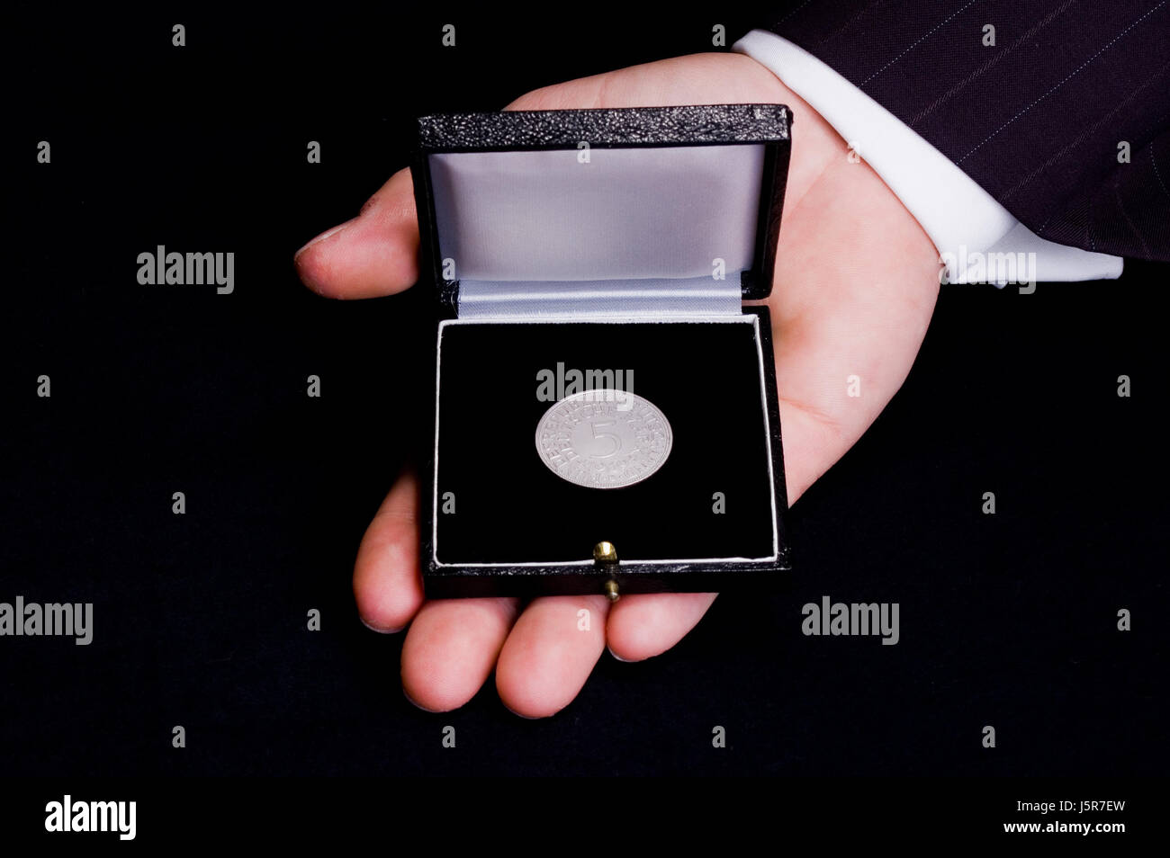 5 DM in mnzschatulle Stockfoto