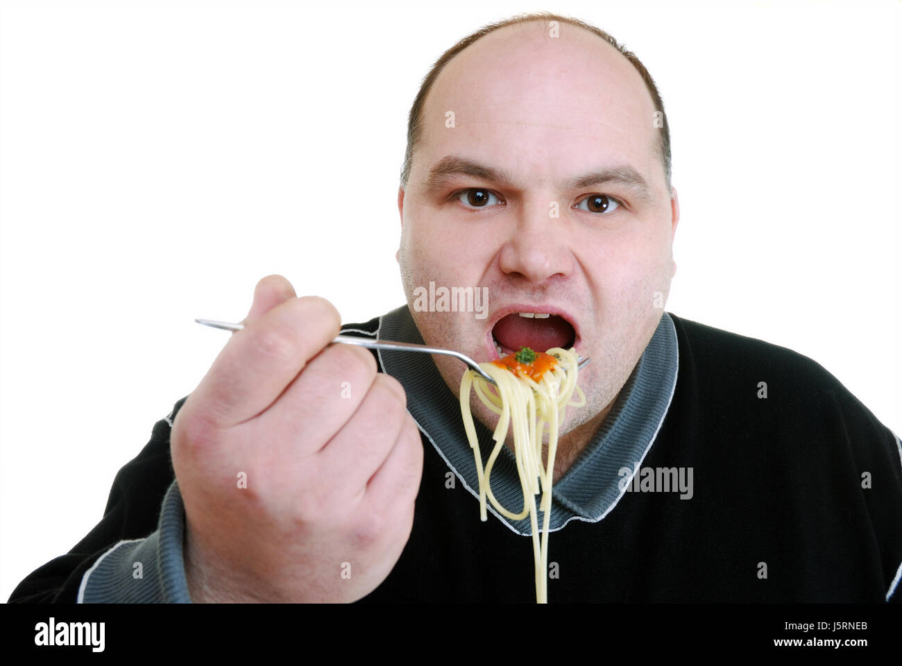 Spaghetti-Essen Stockfoto Spaghetti-Essen Stockfoto