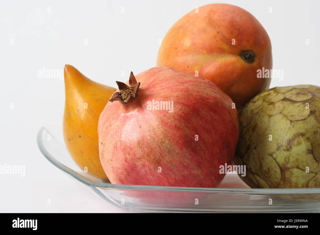 Gesundheit Obst Mandarinen Granatapfel Obstschale Obstschale orange Gesundheit Vitamine Stockfoto