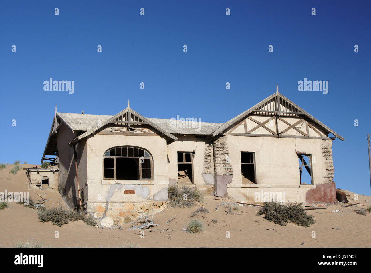 Haus Gebäude historische Wüstenlandschaft Fenster Bullauge Dachgaube Fensterscheibe Stockfoto