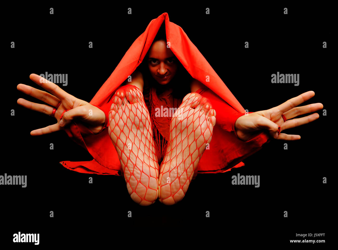 Frau Studio Füße Kap lustige Put sitzen Sit Foto Modell Modell Woman schwarz Stockfoto