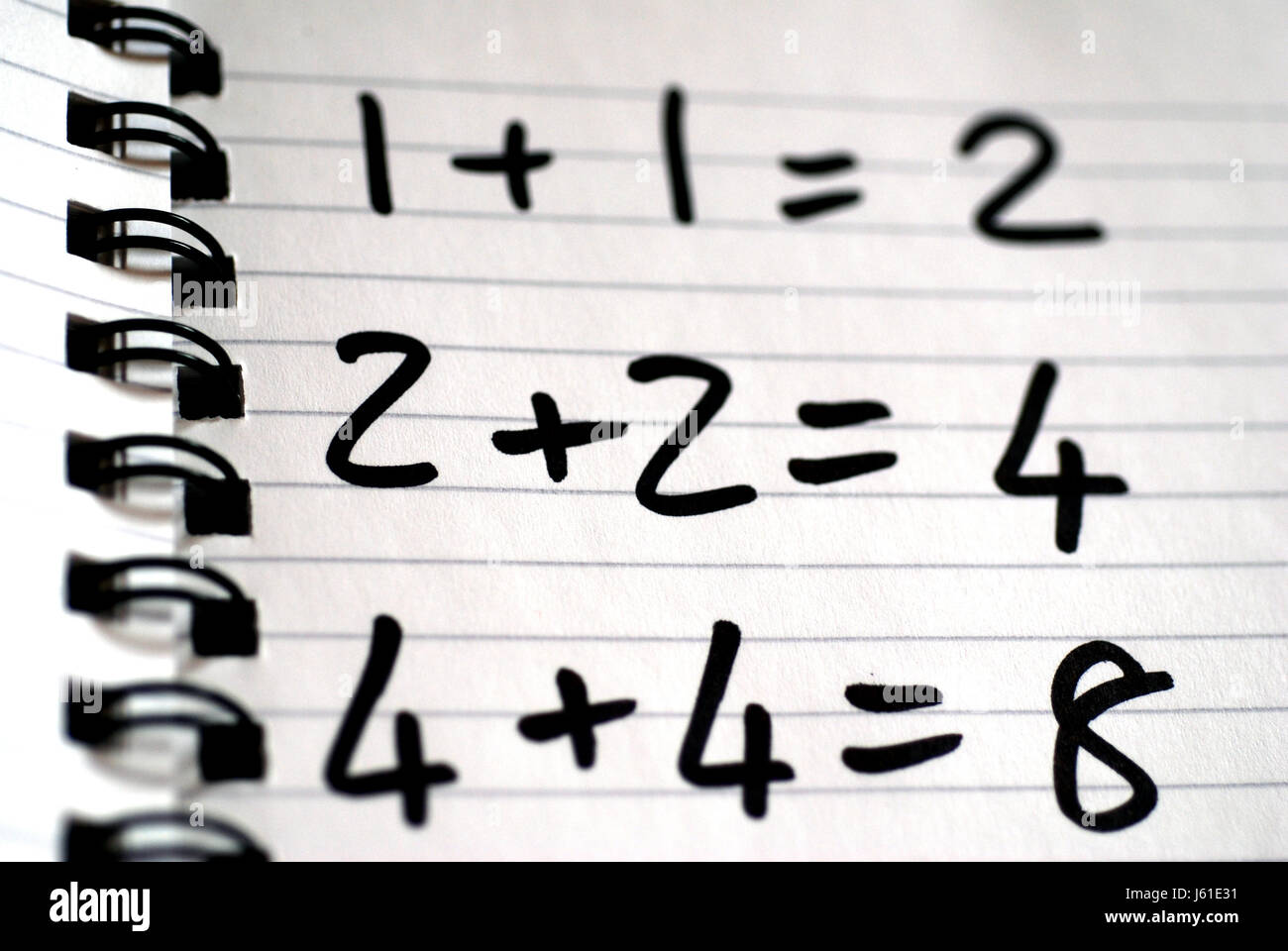 Mathematik Notebook Math zusätzlich Zahlen schreiben schrieb, dass schreiben Schrift schreibt Stockfoto
