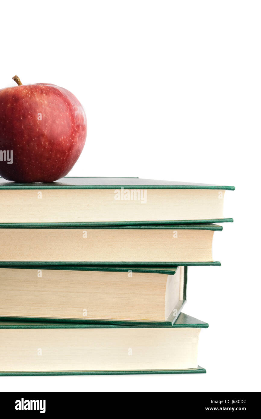 Stapeln Sie Buch Apfel rot essen Nahrungsmittel Studienobjekte Bildung erziehen isoliert Stockfoto