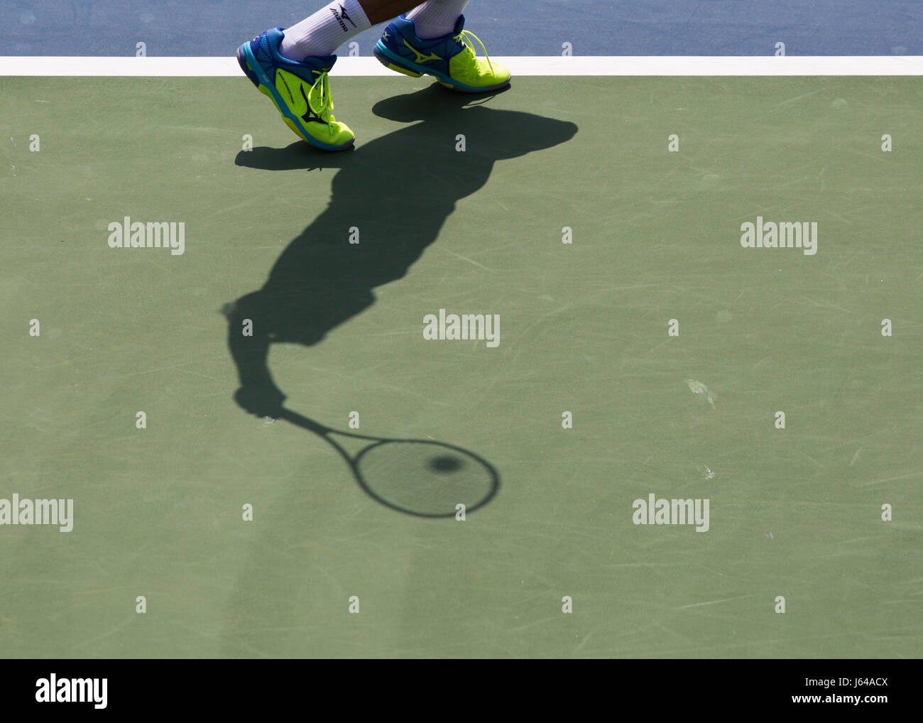 Schatten der Tennisspieler Stockfoto