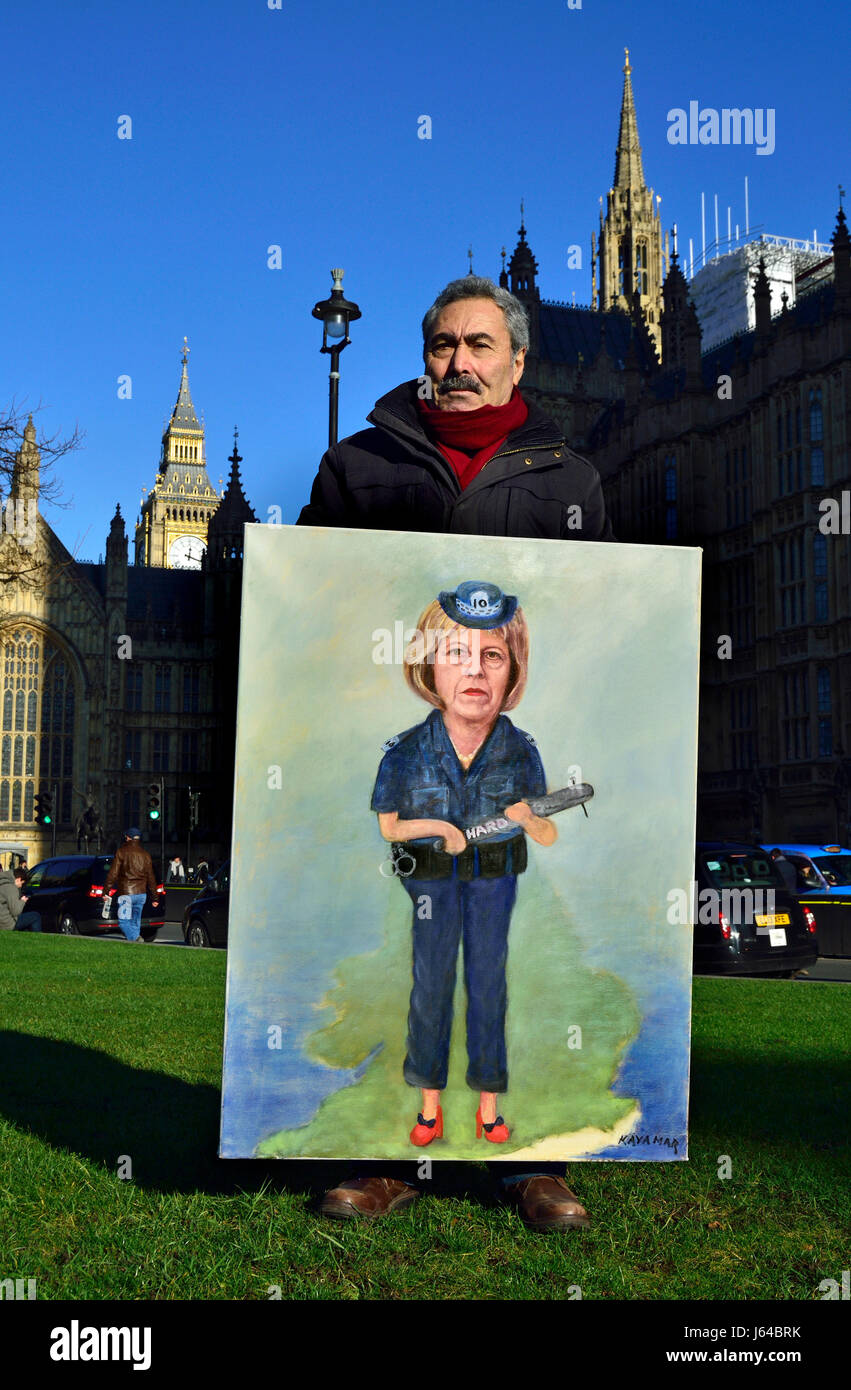 Kaya Mar-politischen Karikaturisten - mit seinem Gemälde von PM Theresa May als Polizeioffizier mit 'harten' Schlagstock Brexit Stockfoto