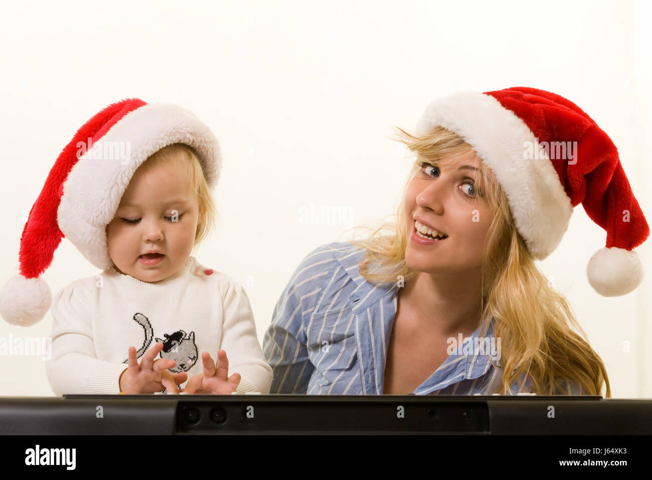 Baby Mutter Mutter Ma Mama Weihnachten Xmas Weihnachten Frau Musik Spiel Turnierspiel Stockfoto