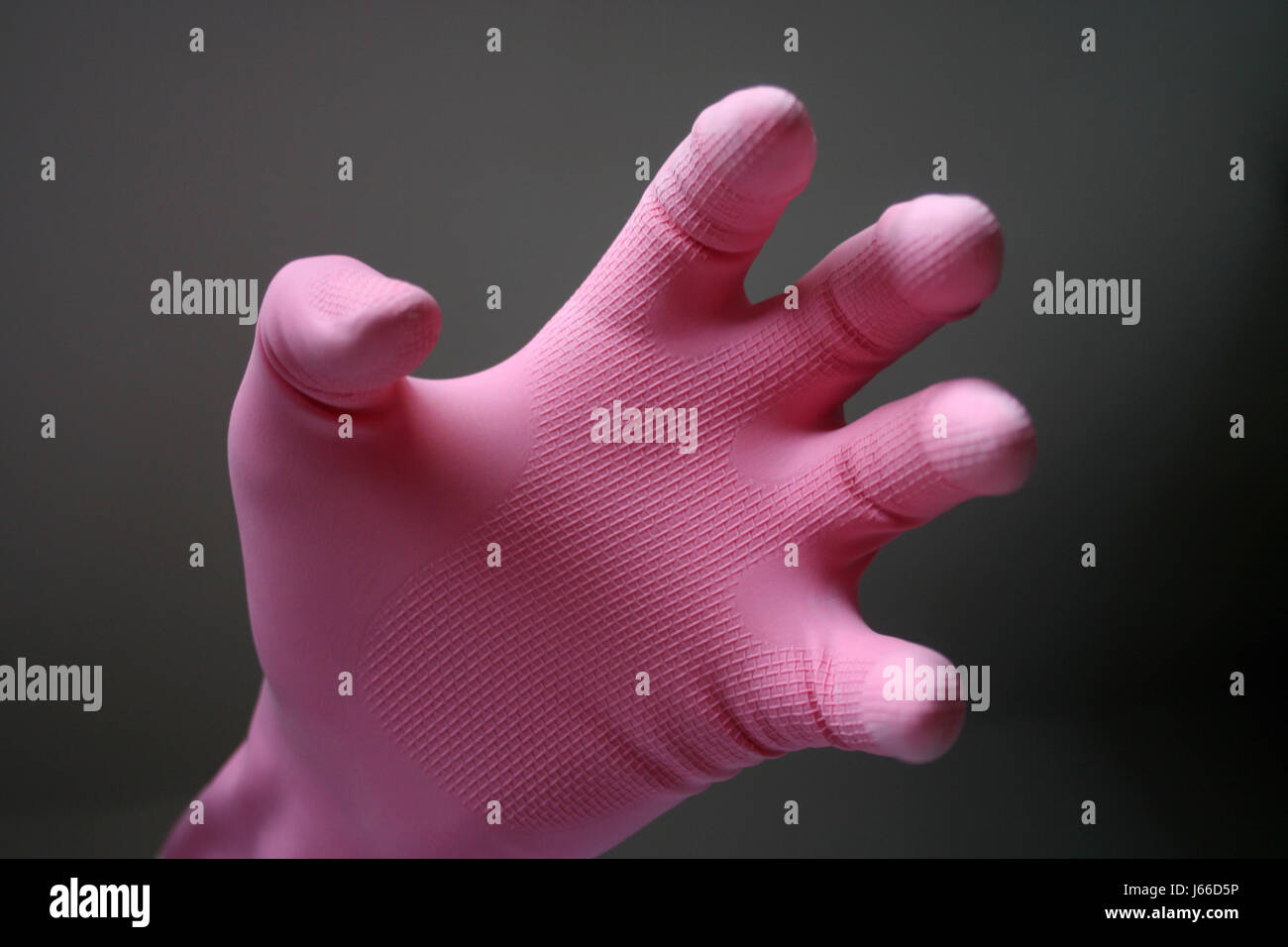 Handschuh Furbisch Kautschuk rosa Finger Haushalt zu schützen Schutz Griff Fang Stockfoto