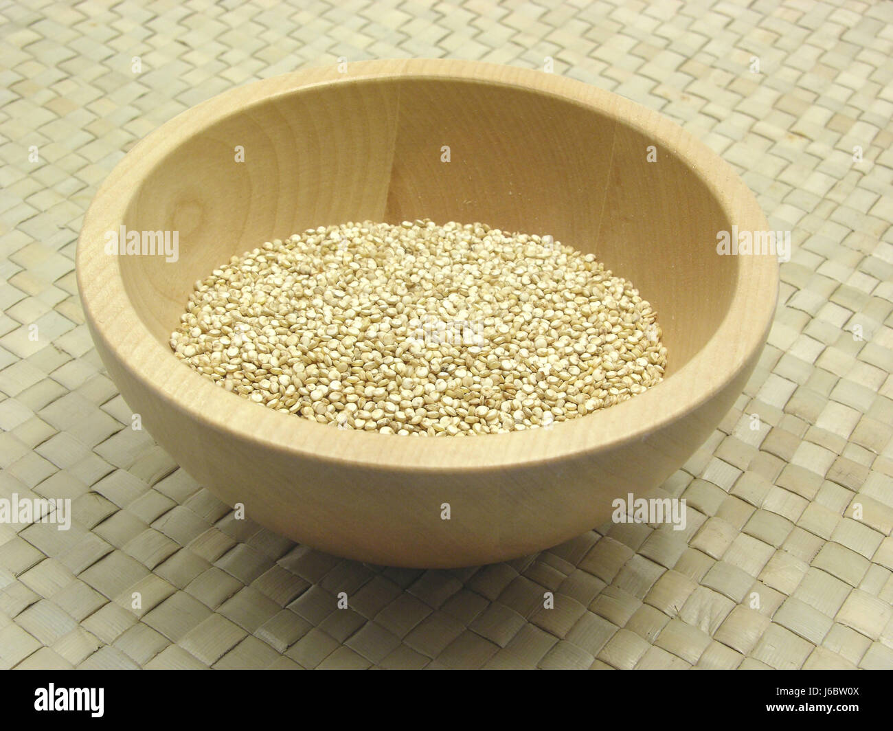 Lebensmittel Nahrungsmittel Holzmaserung biologische Sperma Beige Rattan Mat Schüssel geflochten geflochten Stockfoto