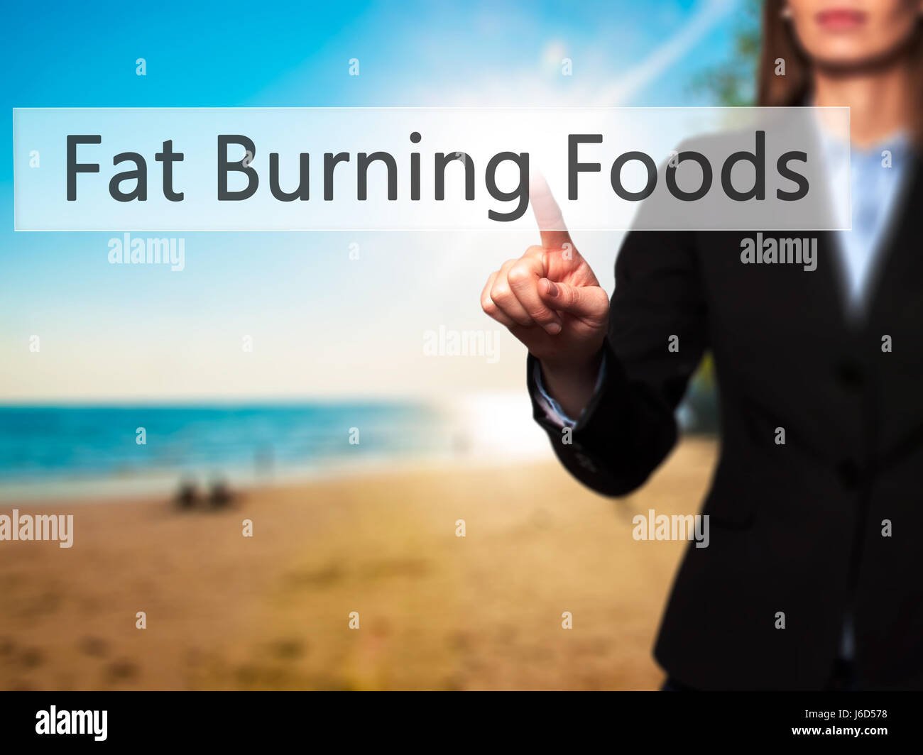 Fat Burning Foods - Geschäftsfrau Hand Taste am touch-Screen-Oberfläche. Wirtschaft, Technologie, Internet-Konzept. Stock Foto Stockfoto