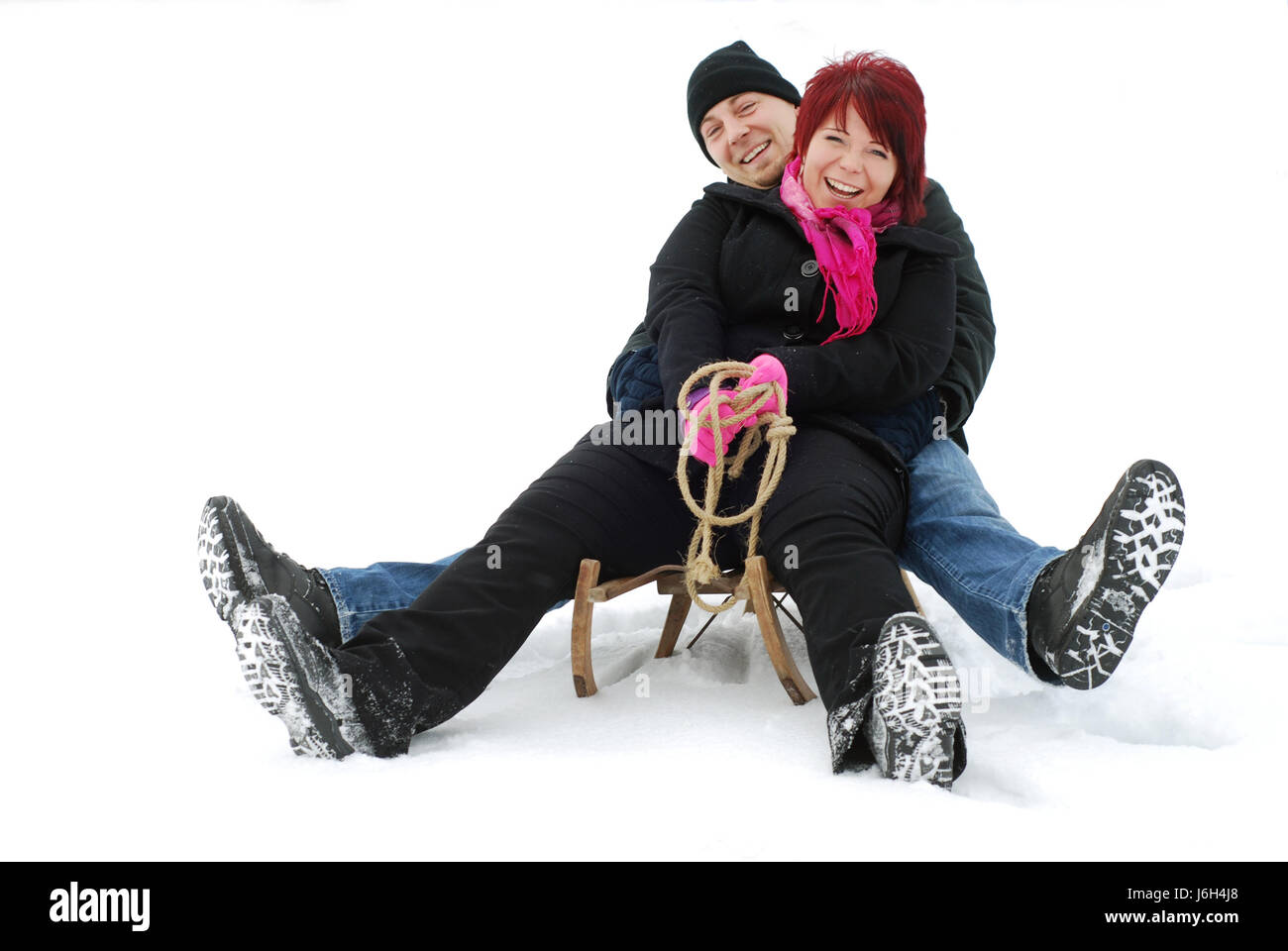 Frau Laufwerk Winter Schlitten Fähren Liebe in Liebe verliebte sich in Liebe paar paar Stockfoto