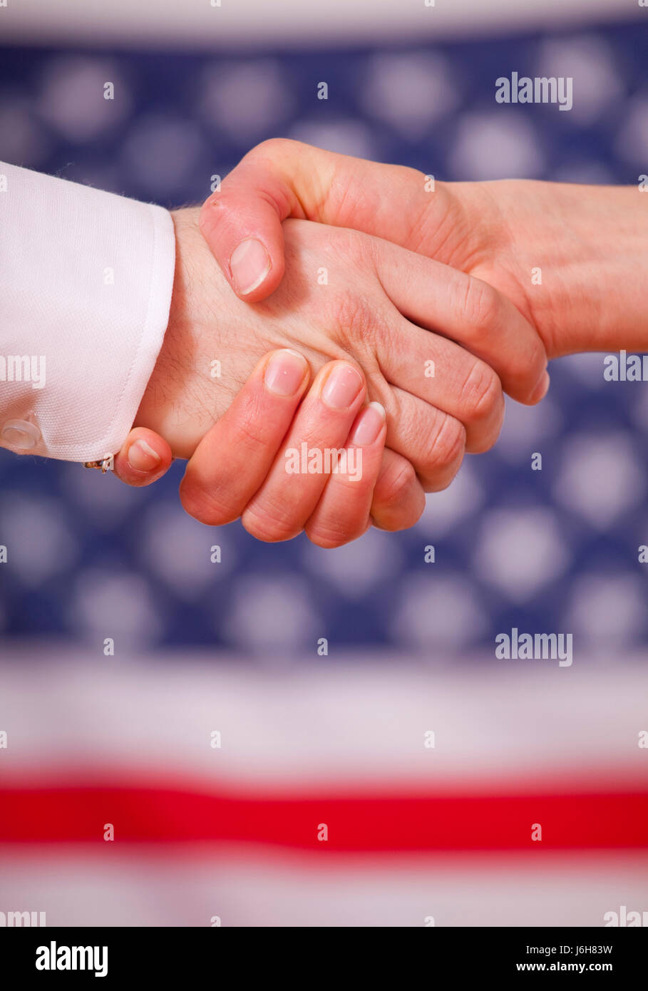 die Hand der Freundschaft amerikanischen schütteln Diplomatie Erfolg Geste Hand Freundschaft Stockfoto